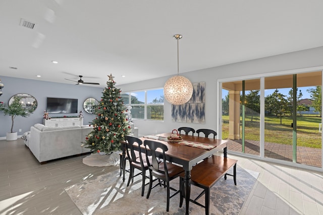 dining room featuring ceiling fan