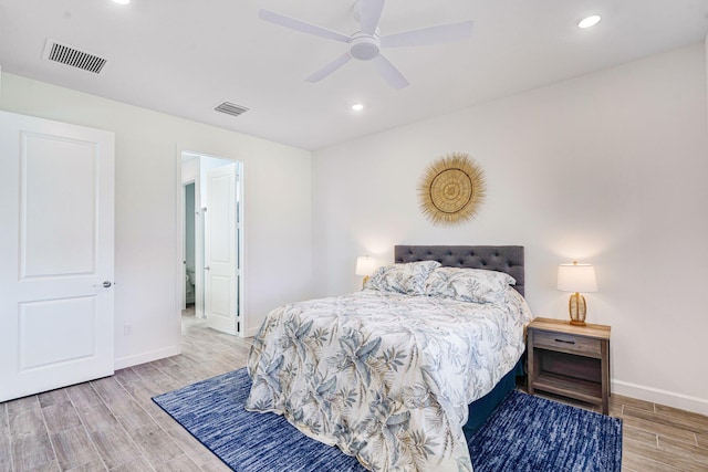 bedroom featuring light hardwood / wood-style flooring and ceiling fan