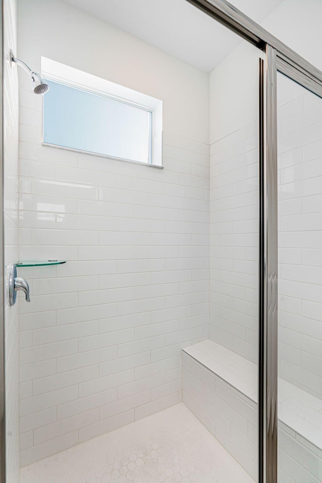 bathroom with an enclosed shower