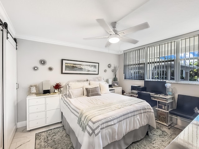 bedroom with a barn door, ceiling fan, and crown molding