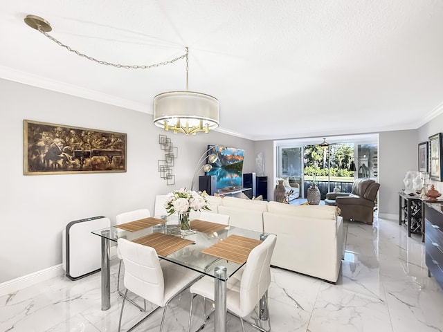 dining area with a textured ceiling and ornamental molding