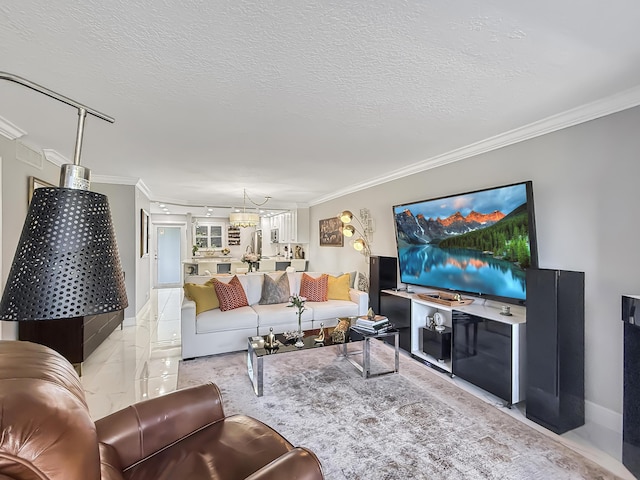 living room featuring crown molding, a textured ceiling, and a notable chandelier