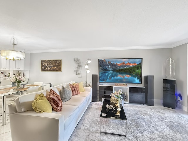 living room with crown molding and a chandelier