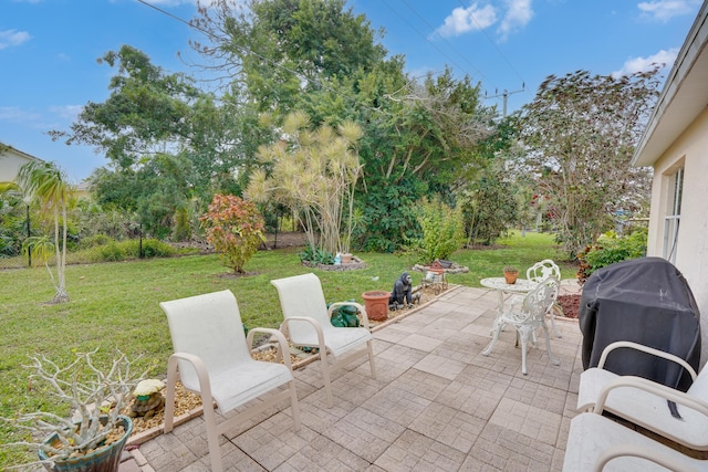 view of patio with a grill