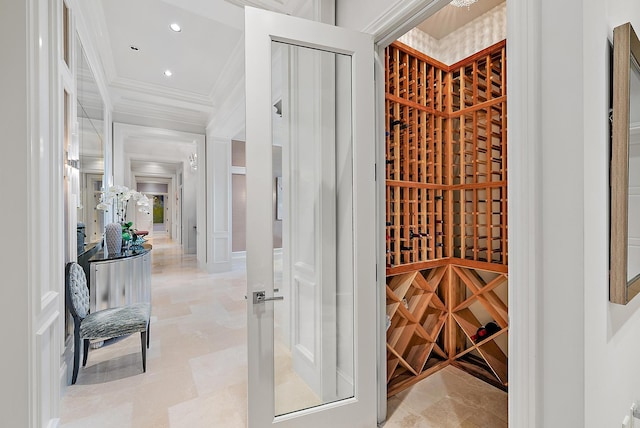 wine room with ornamental molding