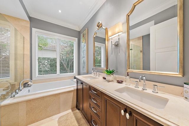 bathroom featuring separate shower and tub, vanity, and ornamental molding