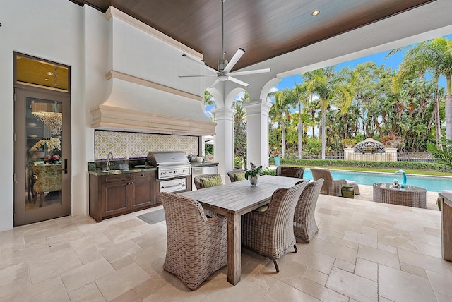 view of patio / terrace with grilling area, sink, ceiling fan, and area for grilling