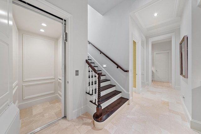 staircase with ornamental molding