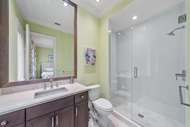 bathroom with a shower with shower door, toilet, and ornamental molding