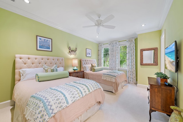 carpeted bedroom with ceiling fan and crown molding