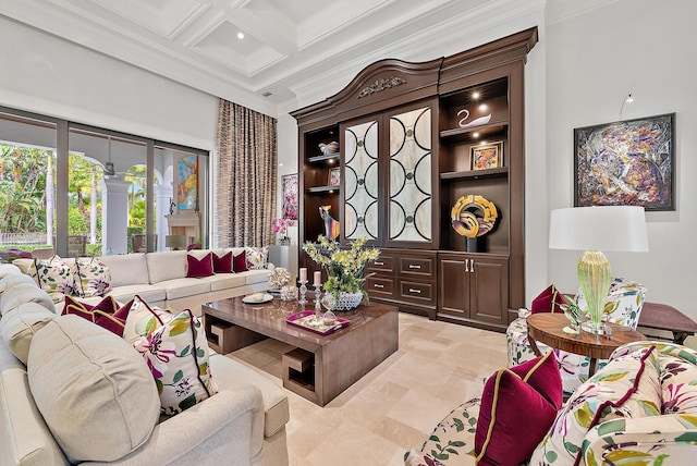 living room featuring beam ceiling, built in shelves, coffered ceiling, and ornamental molding