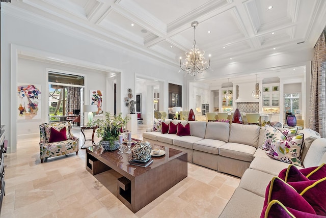 living room featuring an inviting chandelier, crown molding, beam ceiling, and coffered ceiling