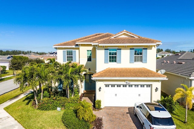 view of front of property with a garage