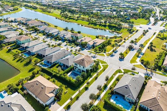 drone / aerial view featuring a water view