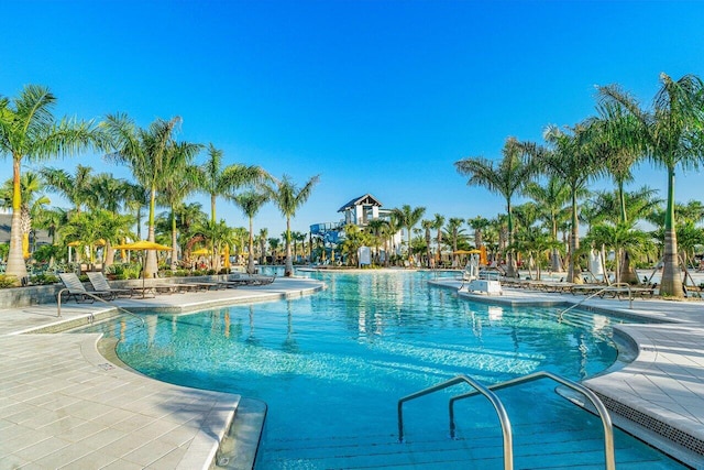 view of pool featuring a patio