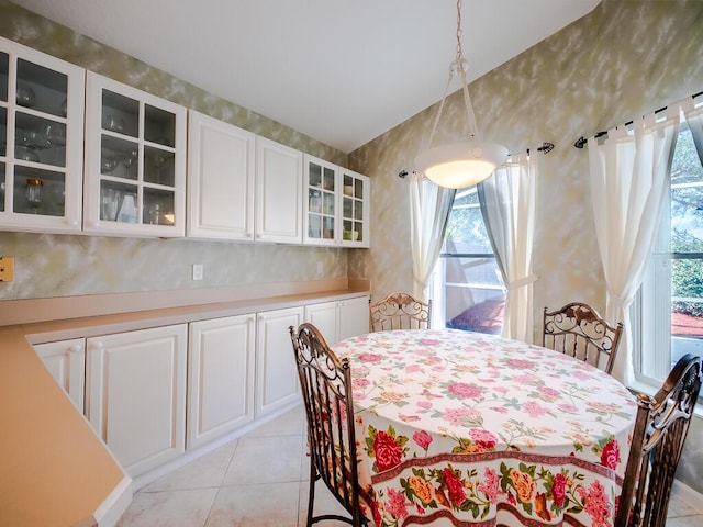 dining space with light tile patterned floors