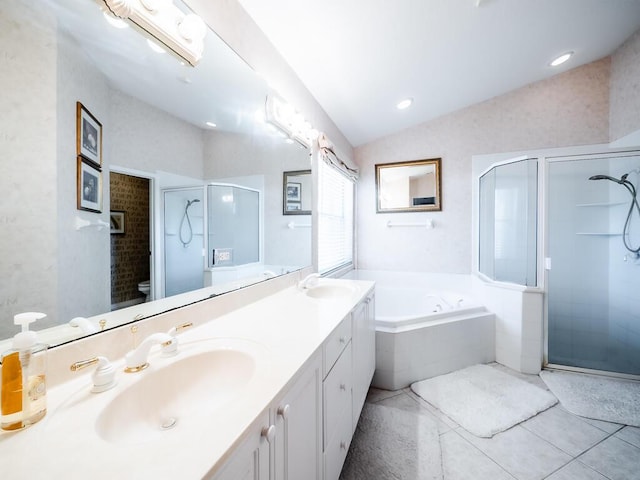 full bathroom with vanity, lofted ceiling, tile patterned floors, separate shower and tub, and toilet