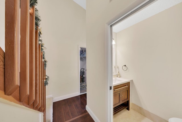 bathroom featuring vanity and wood-type flooring