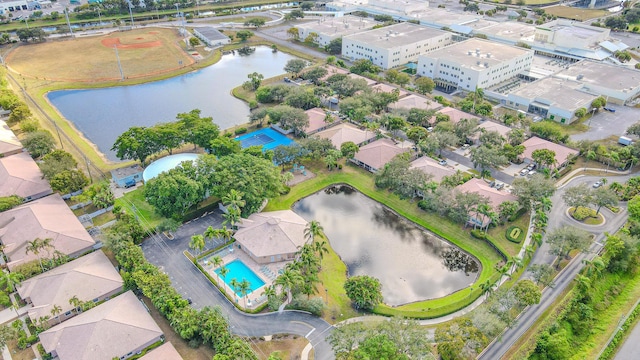 drone / aerial view with a water view