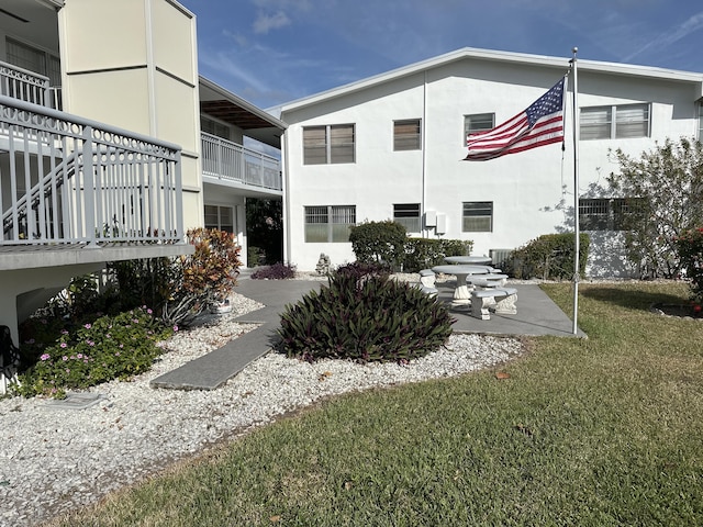 view of community with a lawn