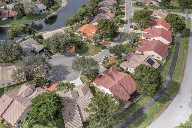 bird's eye view with a water view