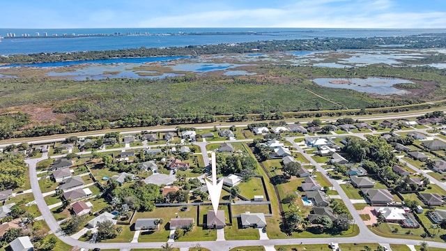 drone / aerial view featuring a water view