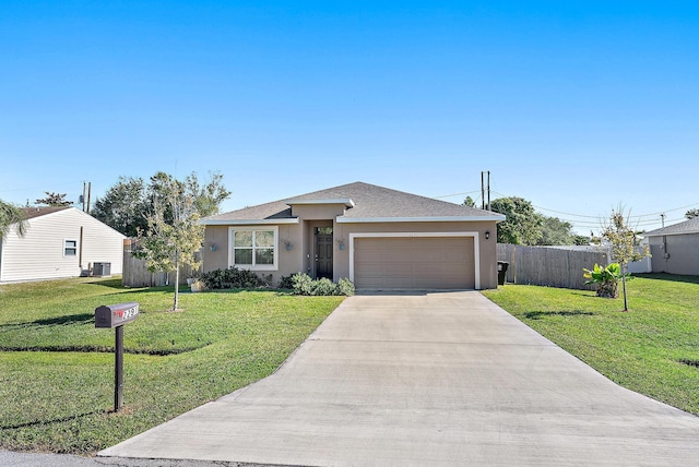 ranch-style house featuring a garage, central air condition unit, and a front lawn