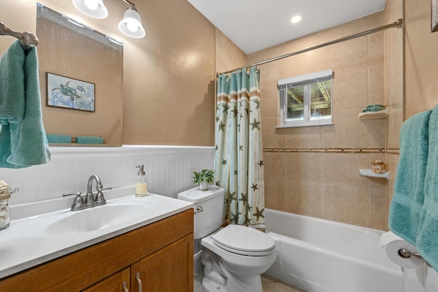 full bathroom featuring vanity, toilet, and shower / bathtub combination with curtain