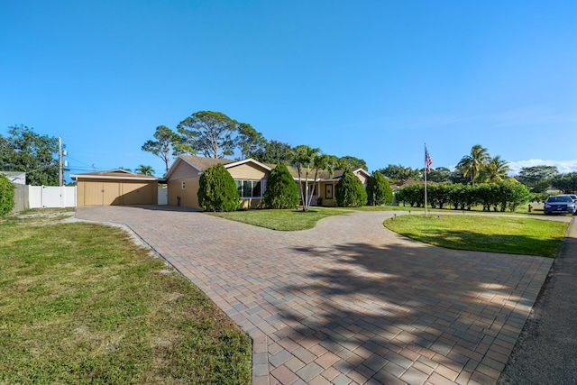 ranch-style home with a front yard