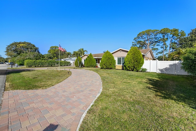 exterior space featuring a front lawn