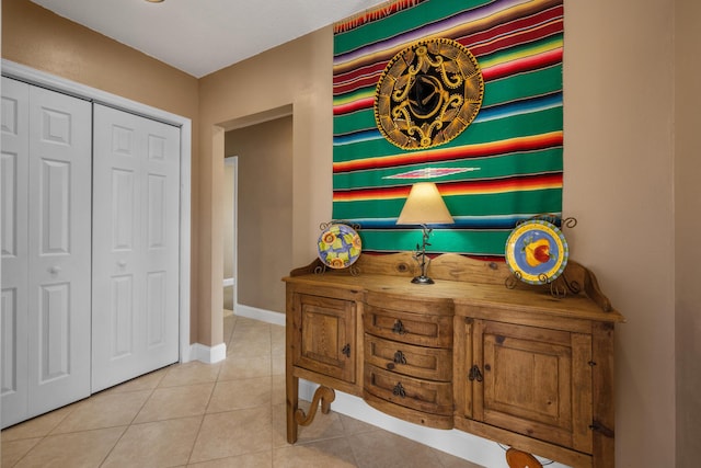 interior space featuring light tile patterned floors