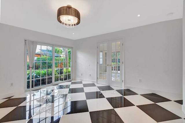 empty room featuring french doors