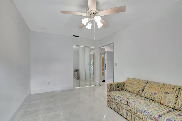 living room featuring ceiling fan