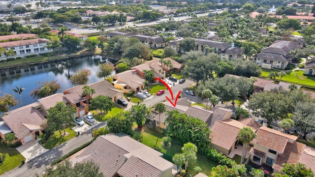 drone / aerial view featuring a water view