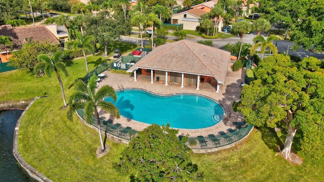 view of swimming pool with a patio