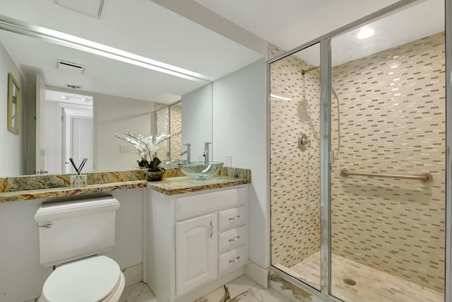 full bath featuring marble finish floor, visible vents, toilet, a shower stall, and vanity