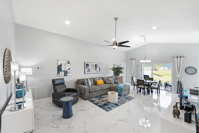 living room featuring ceiling fan with notable chandelier and lofted ceiling