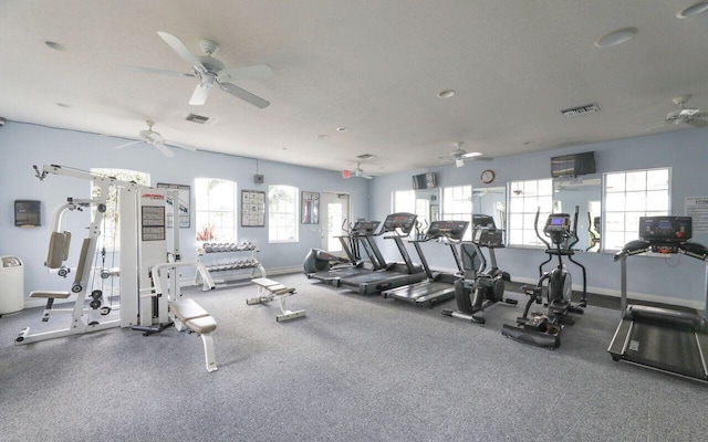 workout area with plenty of natural light and ceiling fan