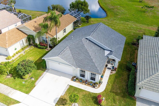 drone / aerial view with a water view