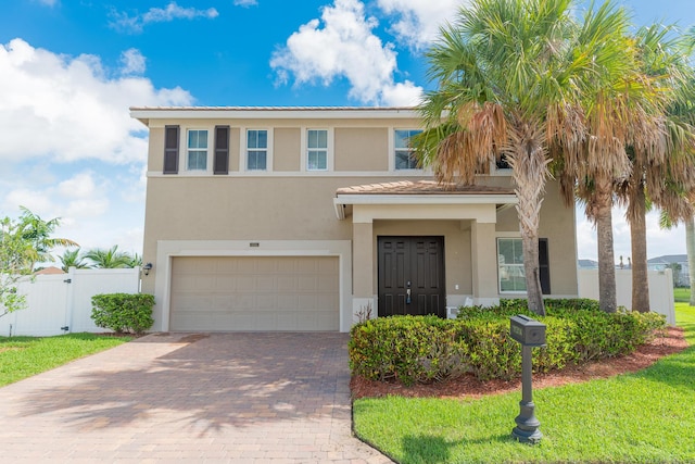 view of front of property with a garage