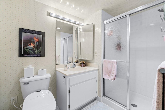 bathroom with a shower with door, vanity, a textured ceiling, and toilet