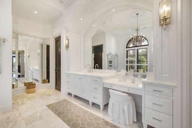 bathroom featuring vanity and ornamental molding