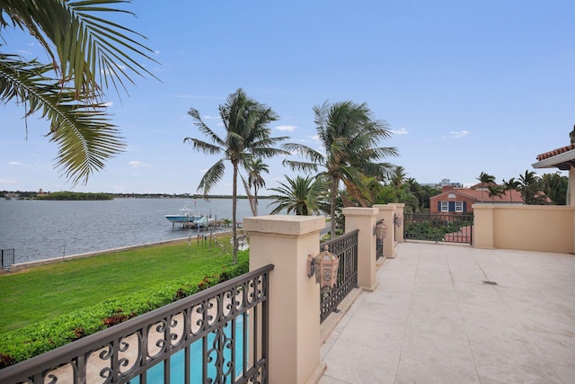 view of gate with a water view