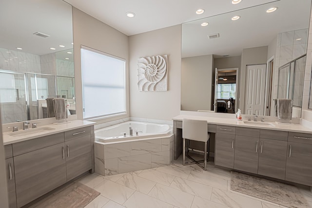 bathroom featuring vanity and plus walk in shower