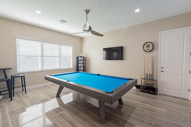 recreation room featuring wood-type flooring, a textured ceiling, ceiling fan, and billiards