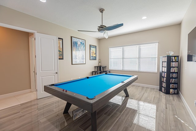 recreation room featuring hardwood / wood-style floors, ceiling fan, a textured ceiling, and billiards