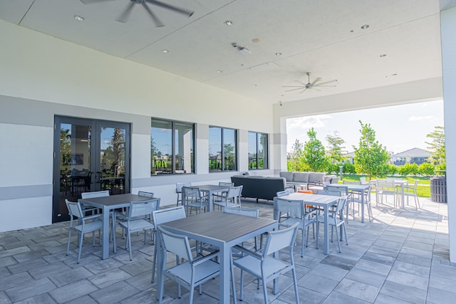 view of patio / terrace featuring an outdoor living space and ceiling fan