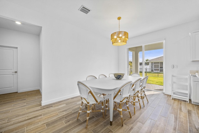 dining room featuring light wood-type flooring