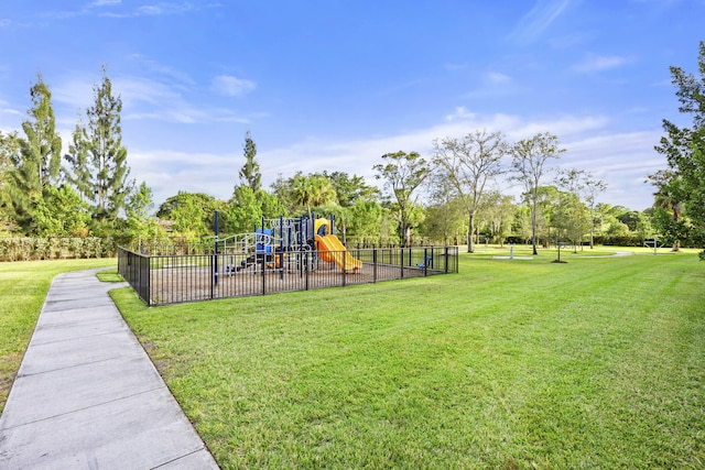 view of playground featuring a yard