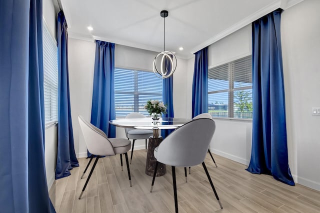 dining area featuring crown molding